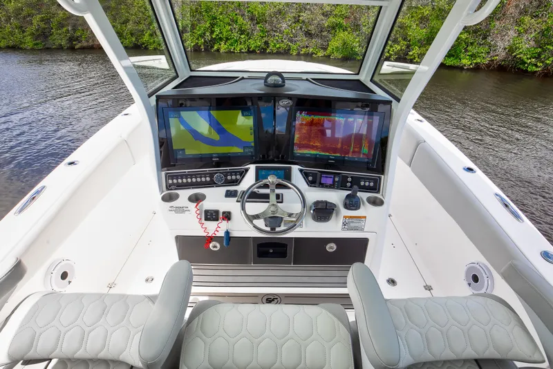 Slide: The Image of 2021 Sea Fox 368 Commander helm with dual displays and fly by wire and joystick controls. - 10