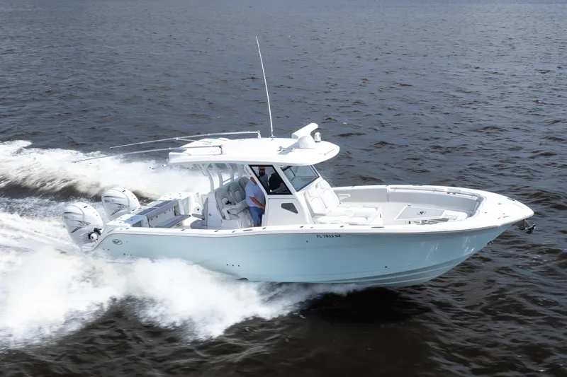 Slide: The Image of 2021 Sea Fox 368 Commander cruising on open water, showcasing sleek design and powerful engines. - 18