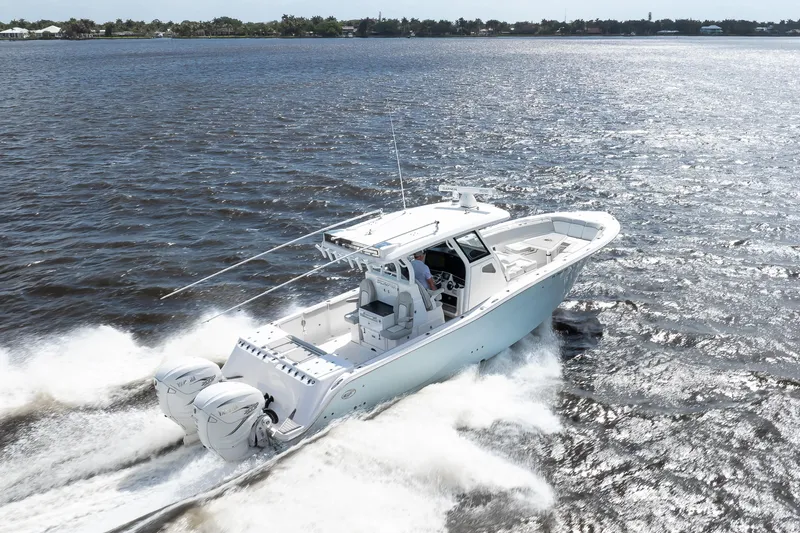 Slide: The Image of 2021 Sea Fox 368 Commander cruising on open water, showcasing sleek design and powerful engines. - 21