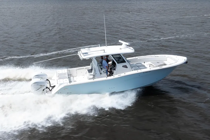 Slide: The Image of 2021 Sea Fox 368 Commander cruising on open water, showcasing sleek design and powerful engines. - 3