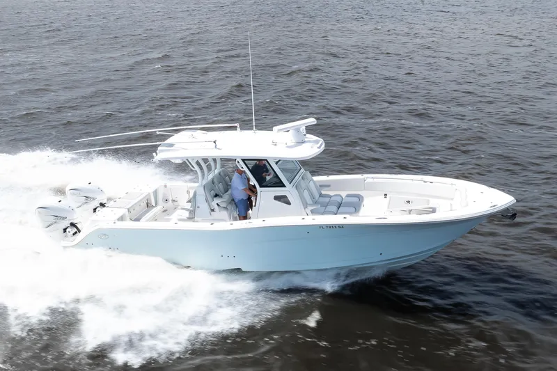Slide: The Image of 2021 Sea Fox 368 Commander cruising on open water, showcasing sleek design and powerful engines. - 4