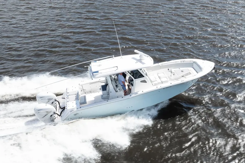 Slide: The Image of 2021 Sea Fox 368 Commander cruising on open water, showcasing sleek design and powerful engines. - 5