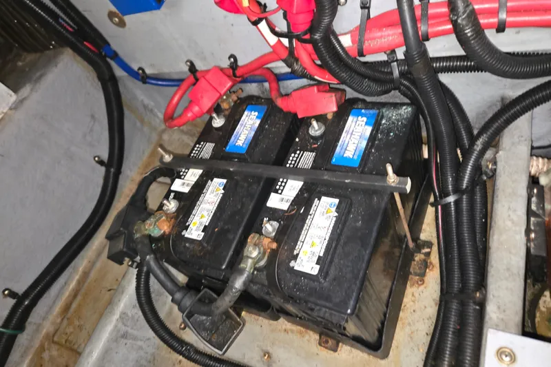 Slide: The Image of Battery compartment of 1998 Sea Ray 340 Amberjack with wiring and connections. - 40