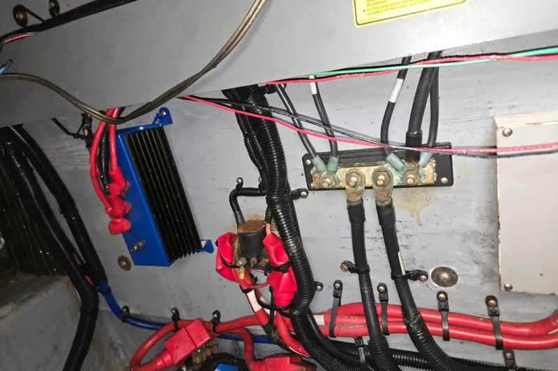Slide: The Image of Electrical wiring and components inside a 1998 Sea Ray 340 Amberjack boat. - 41