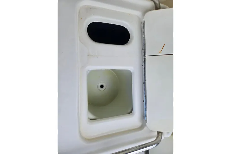 Slide: The Image of 1998 Sea Ray 330 Express boat sink and countertop detail. - 57