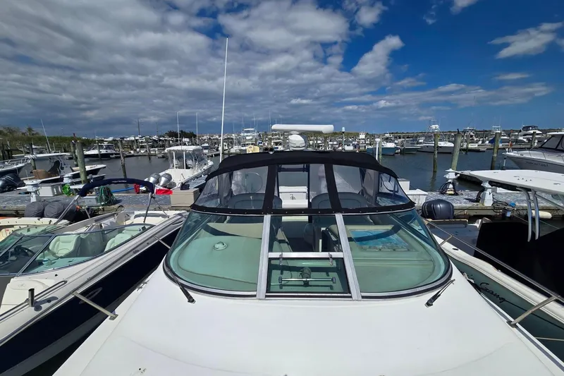 Slide: The Image of 1998 Sea Ray 340 Amberjack boat docked in Cape May, New Jersey marina. - 22