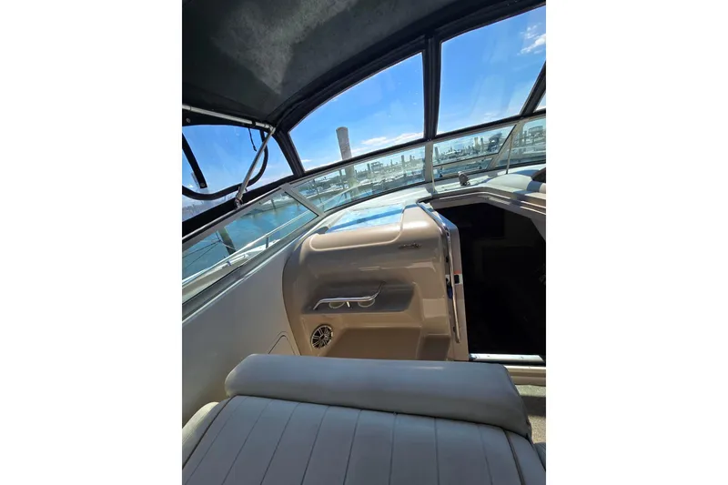 Slide: The Image of Interior view of a 1998 Sea Ray 330 Express boat with open cabin door. - 39