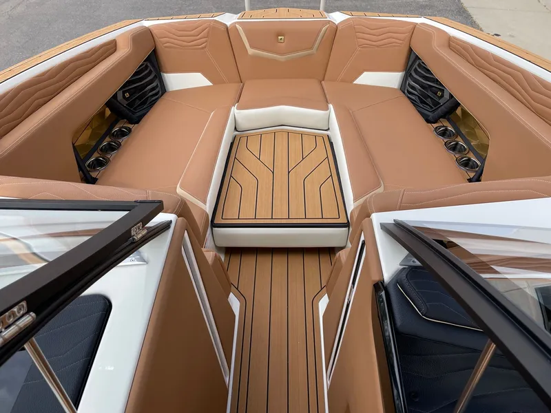 Slide: The Image of Interior of 2026 Nautique G25 with luxurious leather seating. - 11