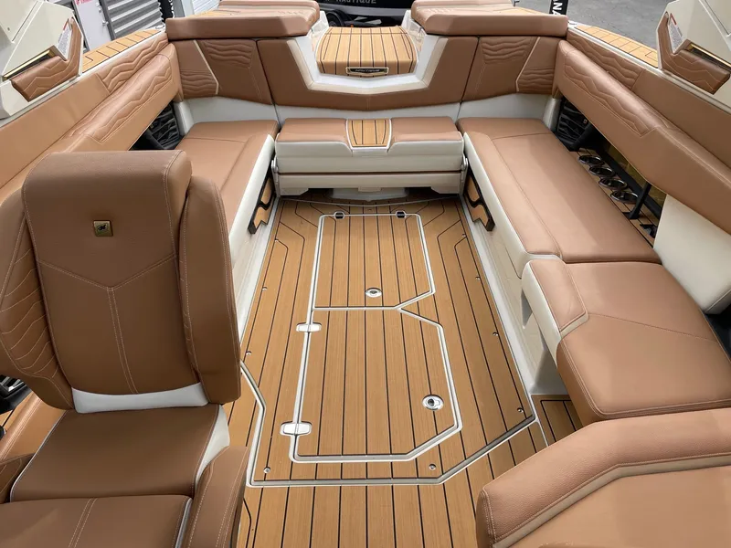 Slide: The Image of Interior of 2026 Nautique G25 with luxurious leather seating. - 12