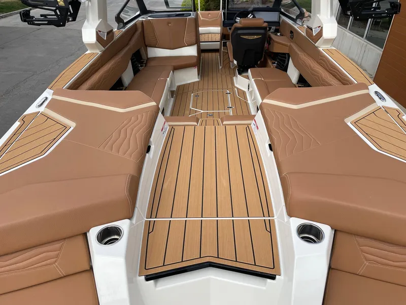 Slide: The Image of Interior of 2026 Nautique G25 with luxurious leather seating. - 4