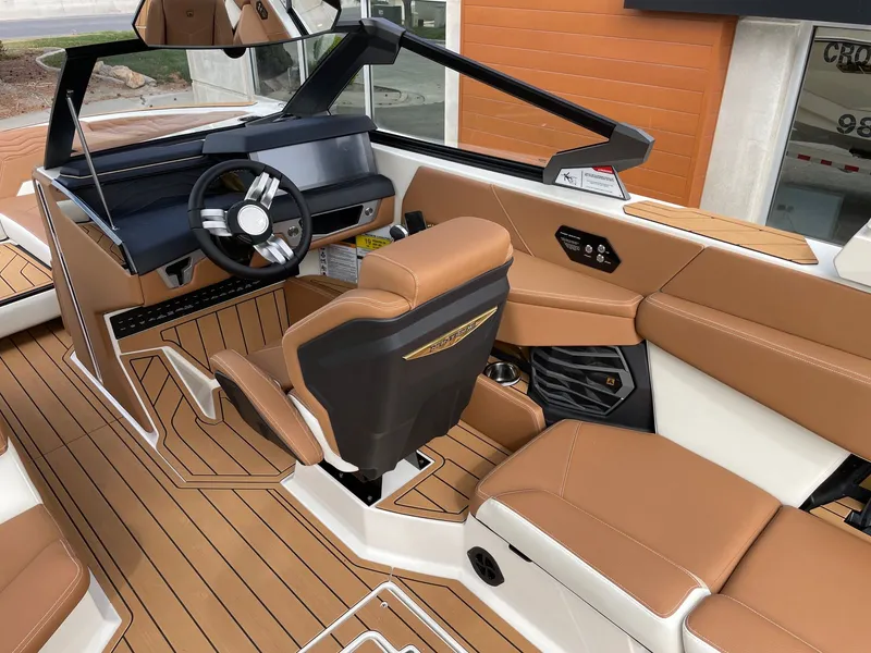 Slide: The Image of Interior of 2026 Nautique G25 with luxurious leather seating. - 6