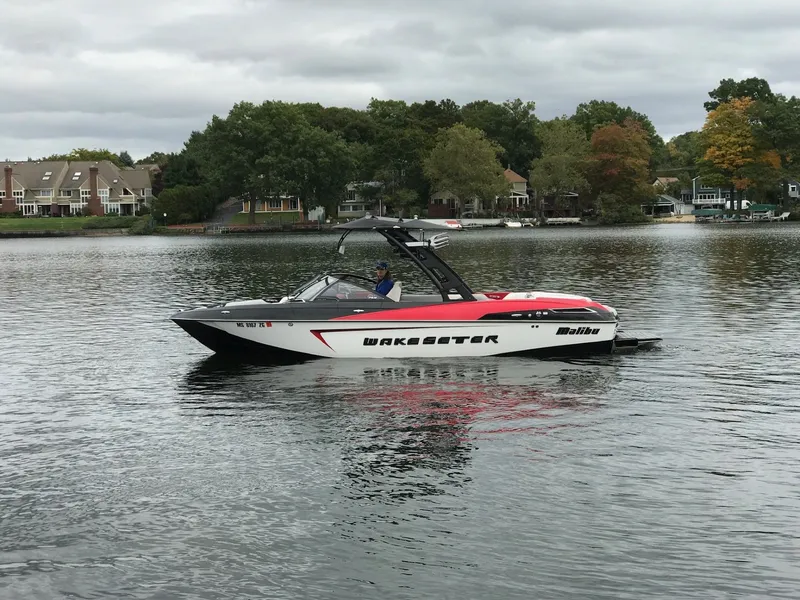 The Image of 2016 Malibu Wakesetter 23 LSV on a calm lake. - 1