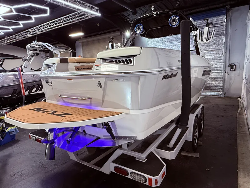 Slide: The Image of 2019 Moomba Makai boat on trailer in a garage. - 12