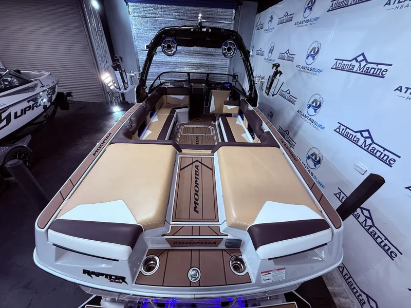 Slide: The Image of 2019 Moomba Makai boat in showroom with Atlanta Marine branding. - 13