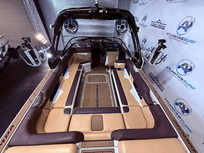 Slide: The Image of Interior of a 2019 Moomba Makai boat, featuring luxurious seating and modern design. - 16