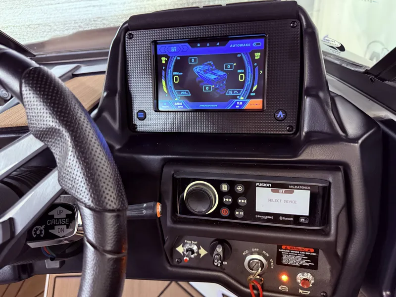 Slide: The Image of 2019 Moomba Makai dashboard with touchscreen and controls. - 33