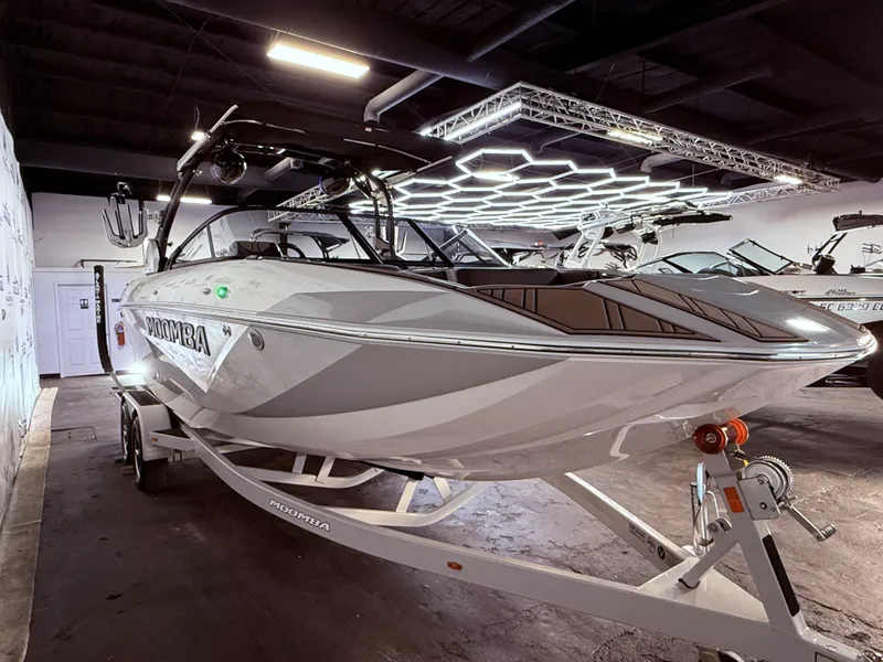 Slide: The Image of 2019 Moomba Makai boat in a showroom. - 8