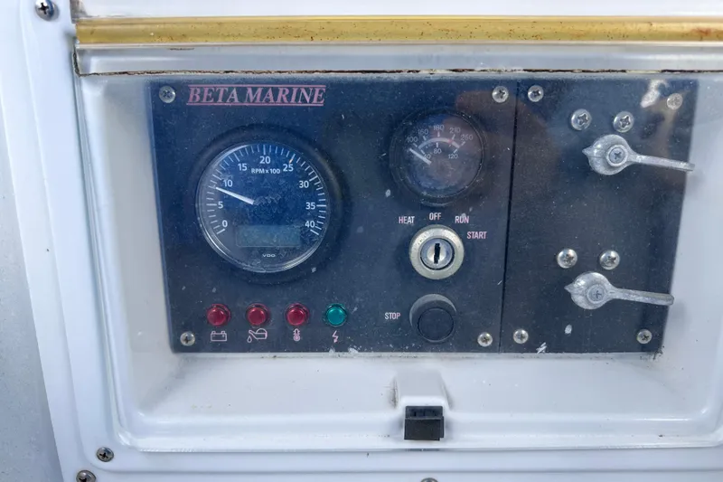 Slide: The Image of Control panel of a 1975 Cape Dory 28 sailboat with Beta Marine engine gauges. - 12