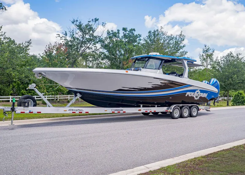 The Image of 2023 Fountain 38 SCX boat on trailer, ready for adventure. - 1