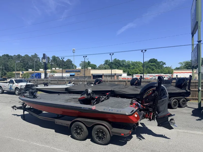 Slide: The Image of 2026 Skeeter ZXE21 boat with special color option in parking lot. - 3