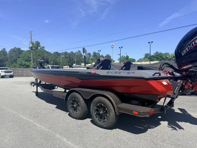 Slide: The Image of 2026 Skeeter ZXE21 boat with special color option on trailer. - 4