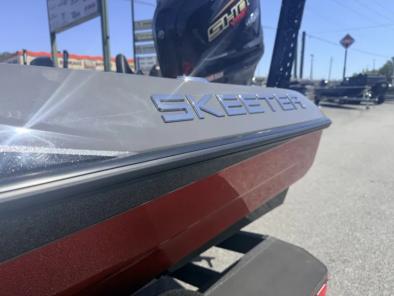 Slide: The Image of Skeeter ZXE21 boat 2026 special color option, shining in sunlight. - 8