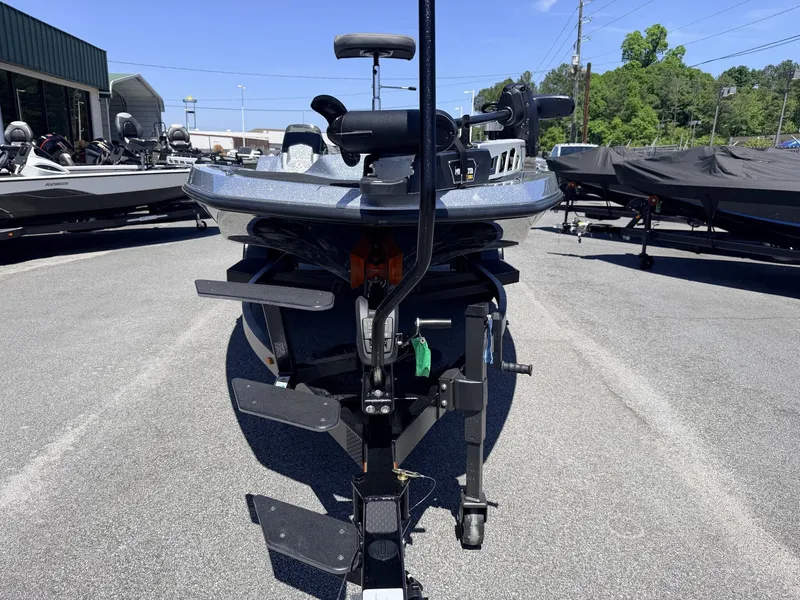 Slide: The Image of iKon Victory Series VLX20 boat, front view in parking lot, 2026 model. - 12