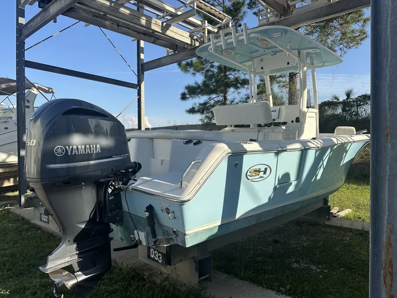 Slide: The Image of 2023 Sea Hunt Ultra 235 SE boat with Yamaha engine. - 3