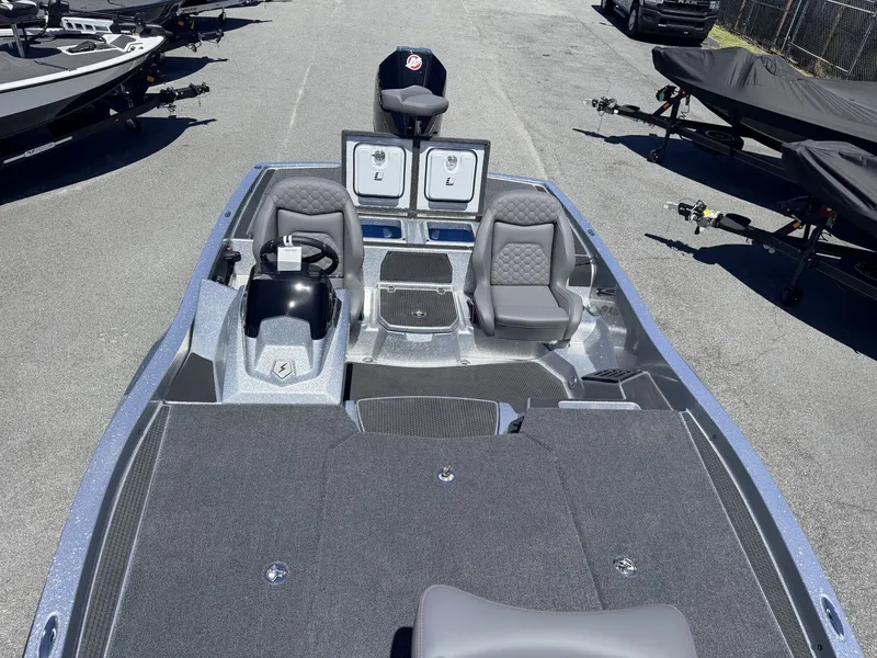 Slide: The Image of iKon Victory Series VLX20 boat, 2026 model, parked outdoors. - 3