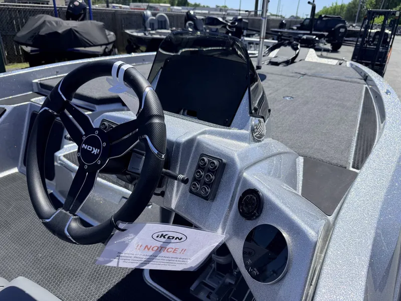 Slide: The Image of iKon Victory Series VLX20 boat cockpit, 2026 model, featuring steering wheel and console. - 15