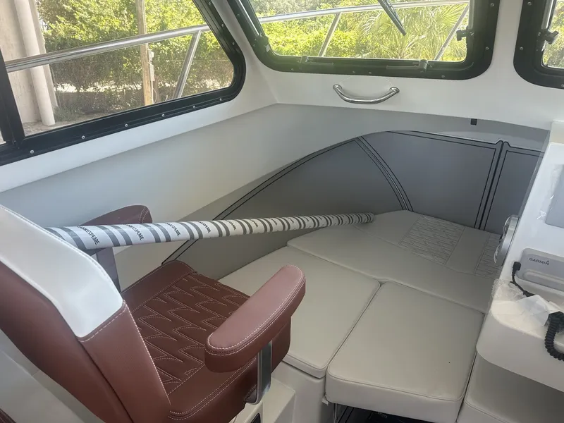 Slide: The Image of Interior of 2026 Parker 227 Explorer with AC and Seakeeper Ride. - 12