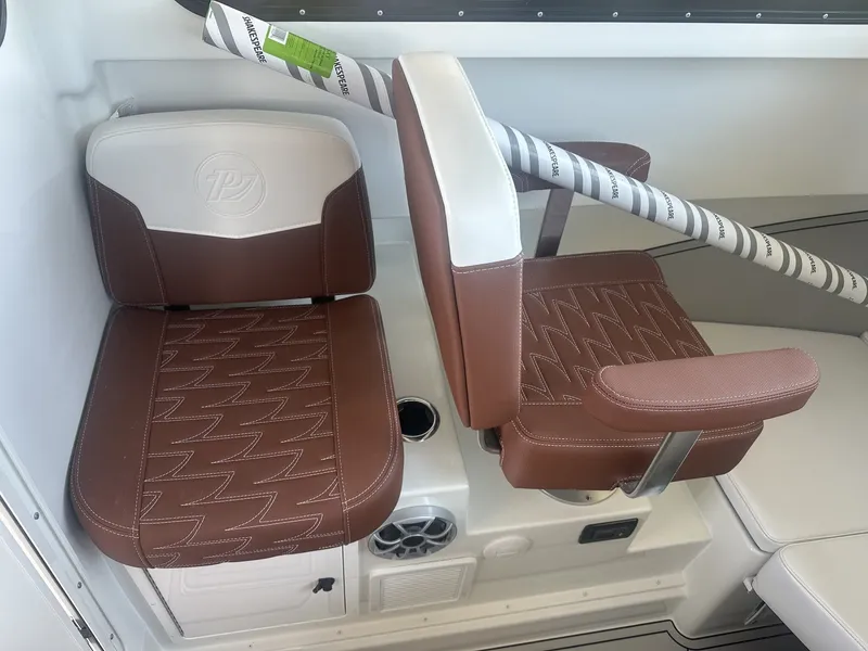 Slide: The Image of Brown leather seats in Parker 227 Explorer boat, model 2026. - 13