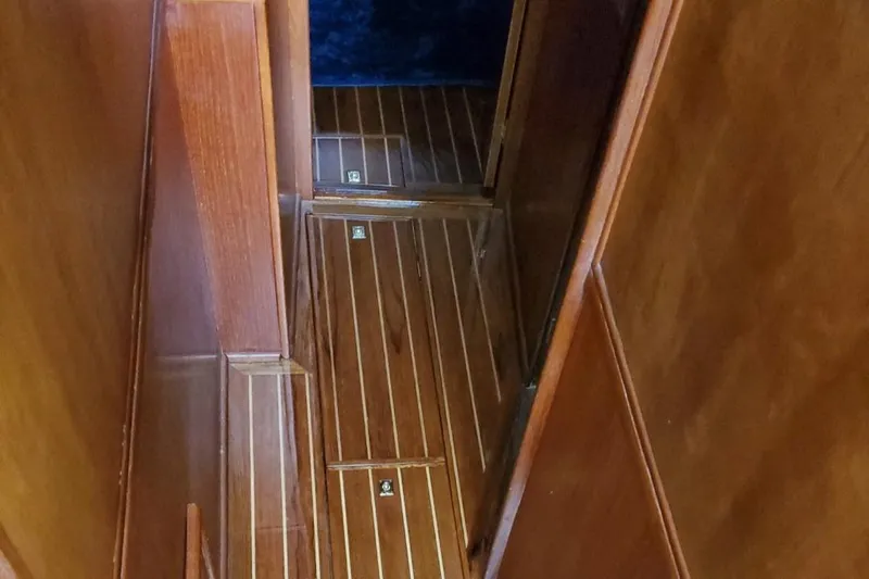 Slide: The Image of 1988 Post 46 Sportfish interior with polished wooden flooring and walls. - 49