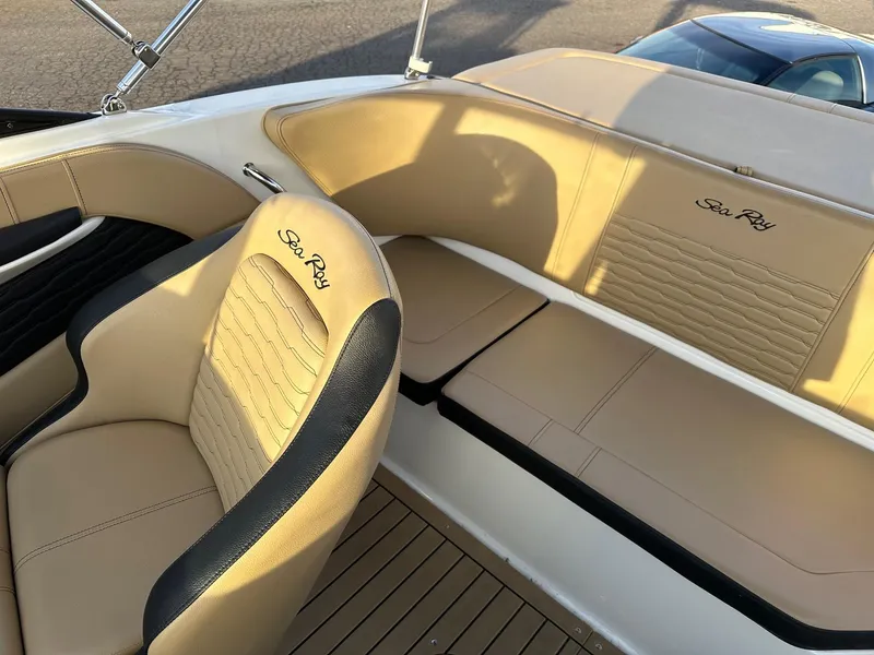 Slide: The Image of Interior of a 2021 Sea Ray SPX 190 with beige seats. - 10