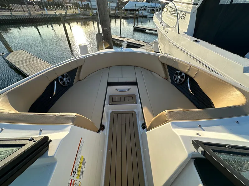 Slide: The Image of Interior view of a 2021 Sea Ray SPX 190 boat at the dock. - 17