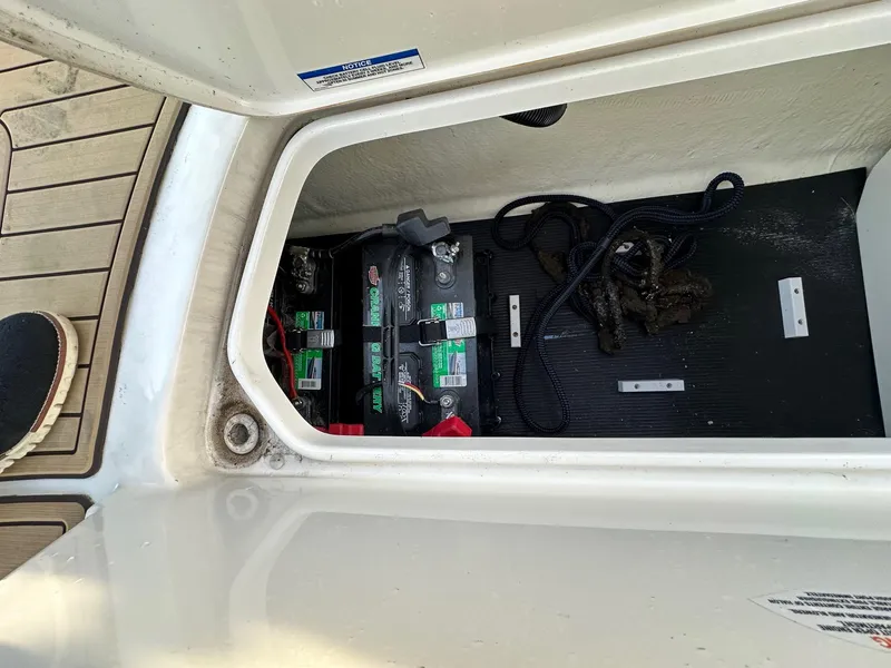 Slide: The Image of Battery compartment of 2021 Sea Ray SPX 190 boat. - 7