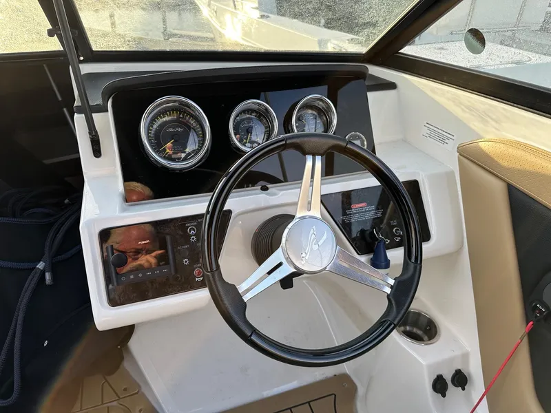 Slide: The Image of Interior view of Sea Ray SPX 190 boat cockpit, 2021 model. - 8