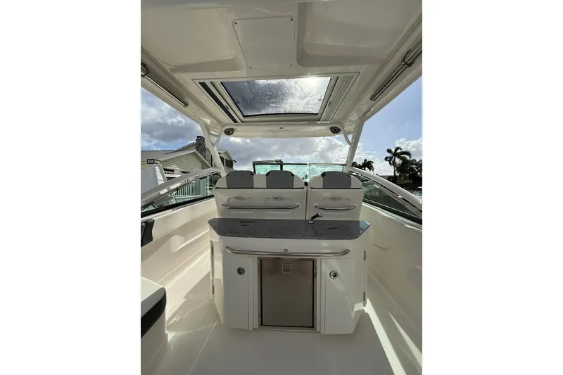 Slide: The Image of 2023 Chaparral 300 OSX boat interior with sleek design and modern amenities. - 20
