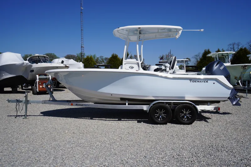 The Image of 2025 Tidewater 210 CC Adventure boat on trailer in outdoor showroom. - 0