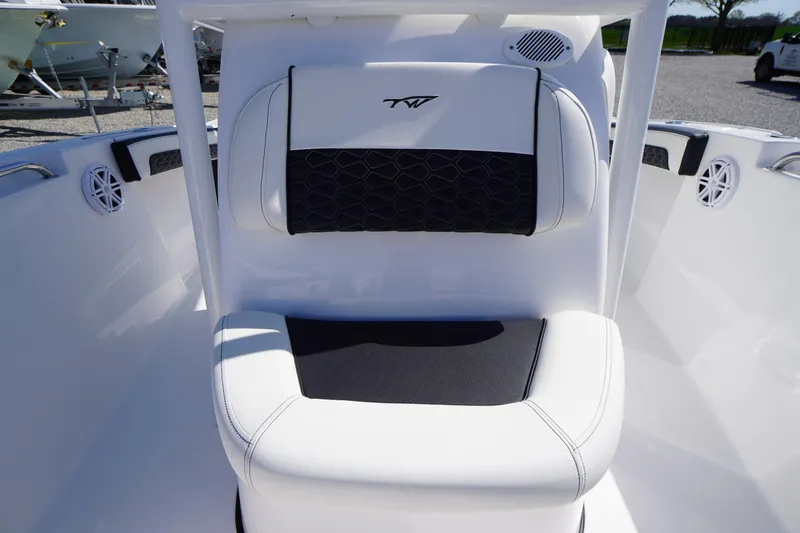 Slide: The Image of 2025 Tidewater 210 CC Adventure boat seat with black and white upholstery. - 12
