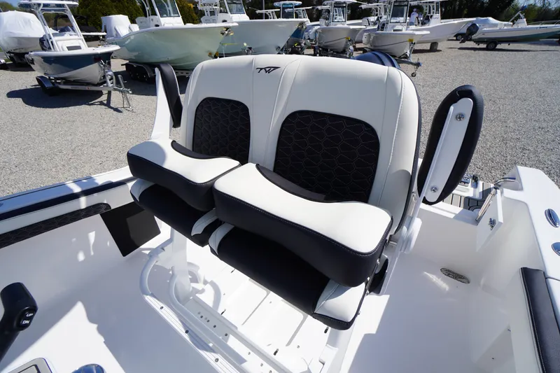 Slide: The Image of Dual seats on a 2025 Tidewater 210 CC Adventure boat, showcasing modern design and comfort. - 21