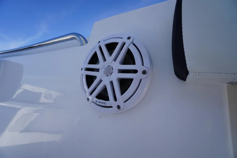 Slide: The Image of Speaker on 2025 Tidewater 210 CC Adventure boat, featuring JL Audio system. - 34