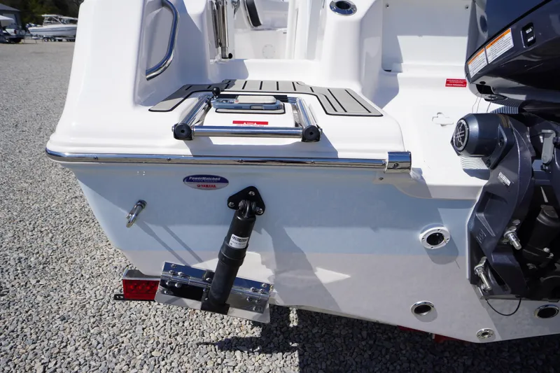 Slide: The Image of 2025 Tidewater 210 CC Adventure boat stern with motor and swim platform. - 35