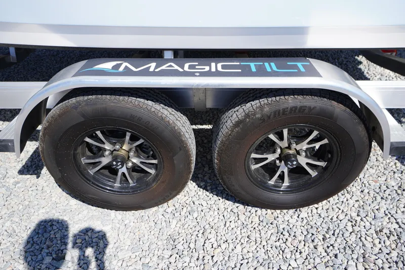 Slide: The Image of Magic Tilt trailer with dual wheels for 2025 Tidewater 210 CC Adventure boat. - 39