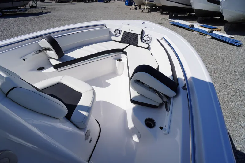 Slide: The Image of 2025 Tidewater 210 CC Adventure boat interior with sleek seating and modern design. - 6