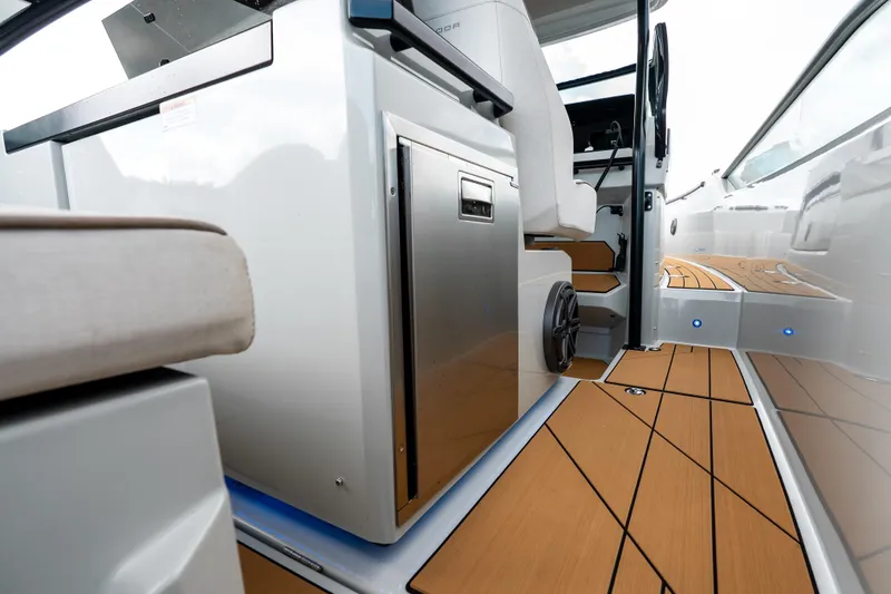 Slide: The Image of 2024 Saxdor 320 GTO interior with sleek design, modern seating, and wooden flooring. - 15