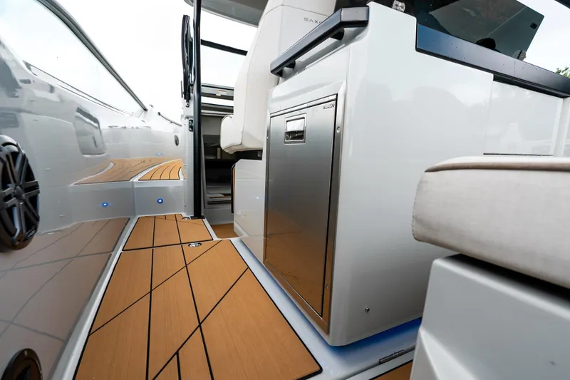Slide: The Image of 2024 Saxdor 320 GTO interior with sleek design, modern flooring, and stainless steel features. - 16