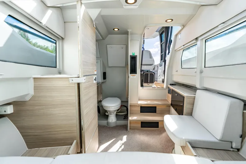 Slide: The Image of Interior of 2024 Saxdor 320 GTO boat, featuring modern design and comfortable seating. - 39