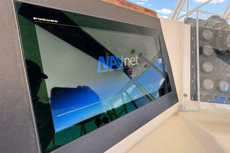 Slide: The Image of Furuno NavNet TZtouch2 display on 1989 Bertram 50 Convertible yacht dashboard. - 7