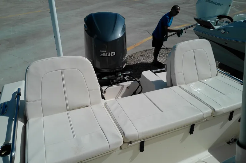 Slide: The Image of 2015 Grady-White 251 Coastal Explorer boat with Yamaha 300 engine and white seating. - 11